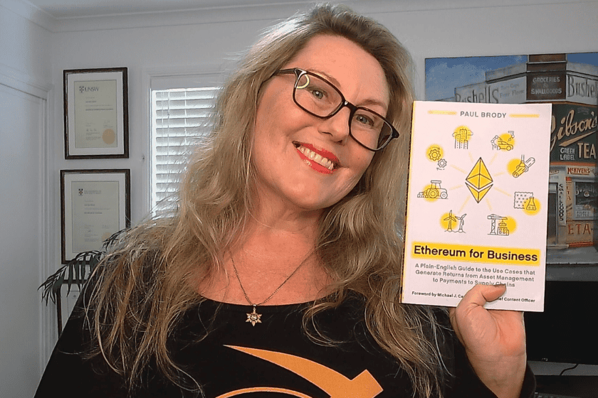 federal-election-GettyImages-72867997 Image of Electra Frost holding a book titled Ethereum for Business