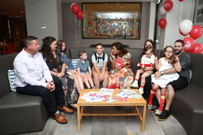 Eva Mendes talking to Children for the Ronal McDonald foundation