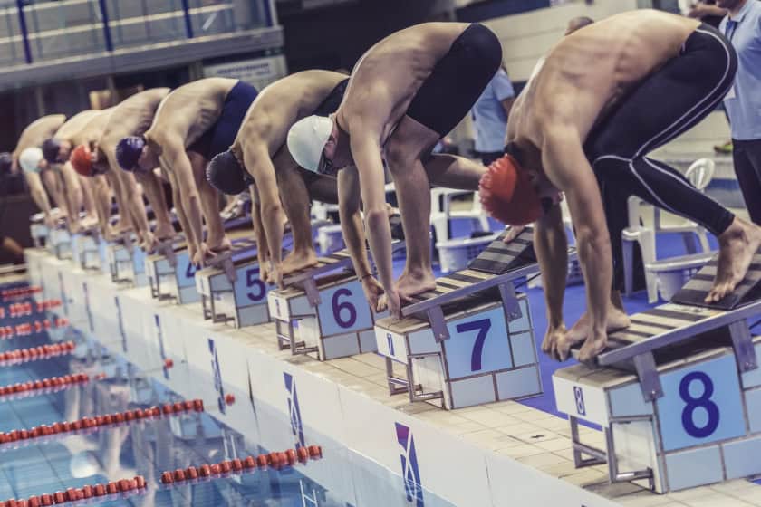 Swimming competetion. The swimmers are preparing to start.