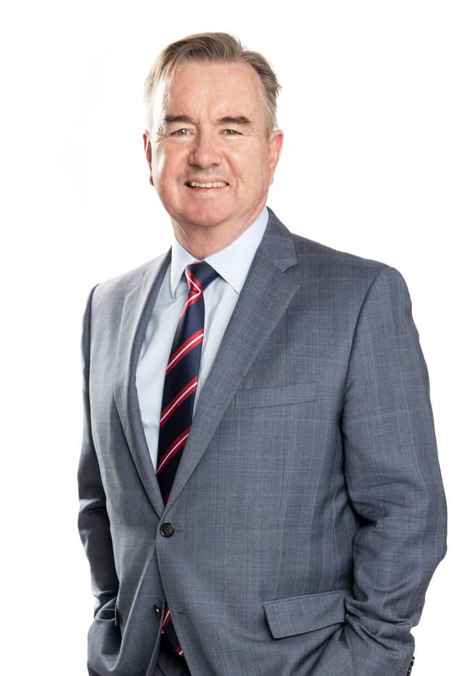 Headshot of Peter de Cure