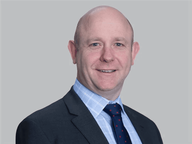 Headshot of Adrian Hunter