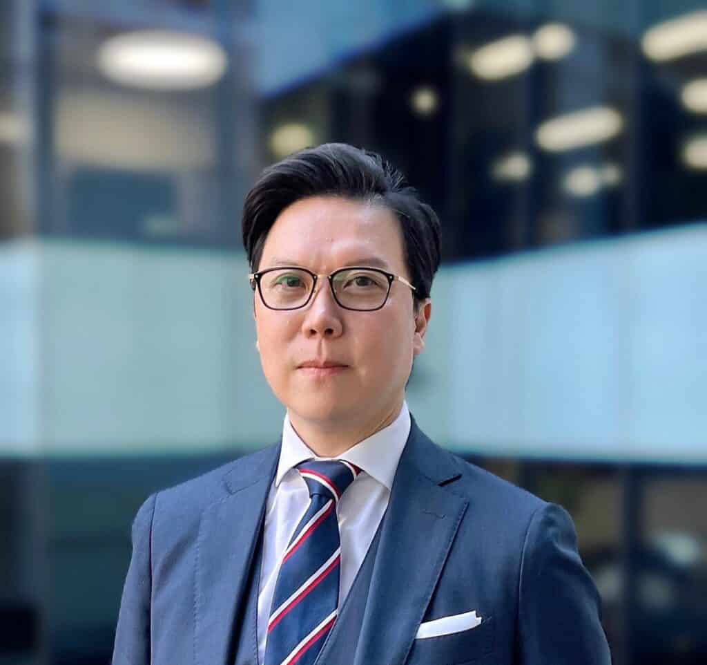 Headshot of Caxton Pang